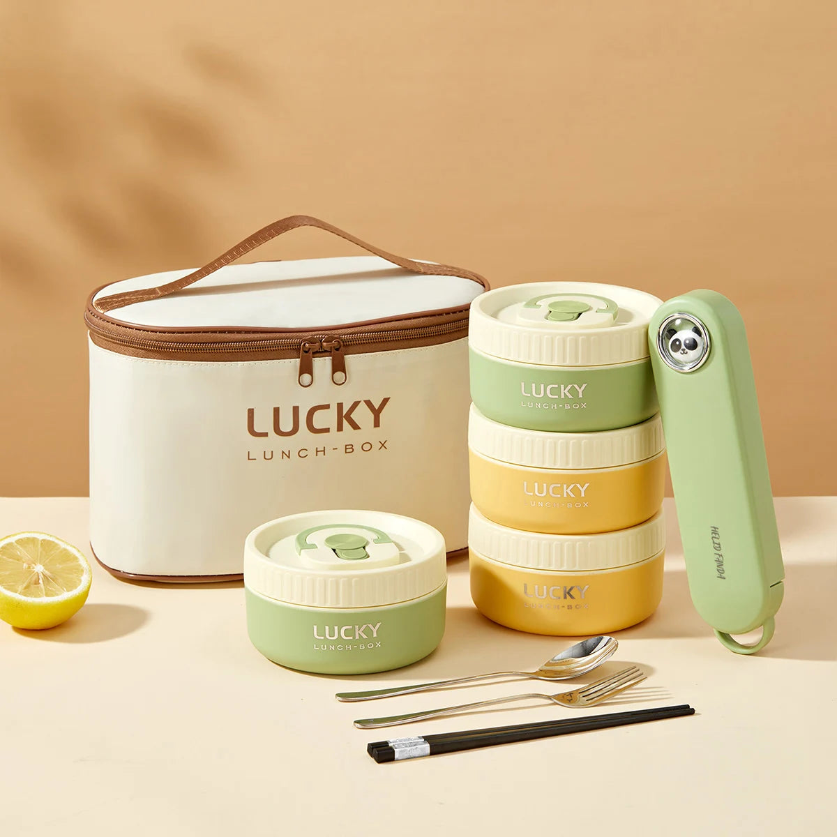 Lucky lunch box set with containers, bag, and utensils on a beige background