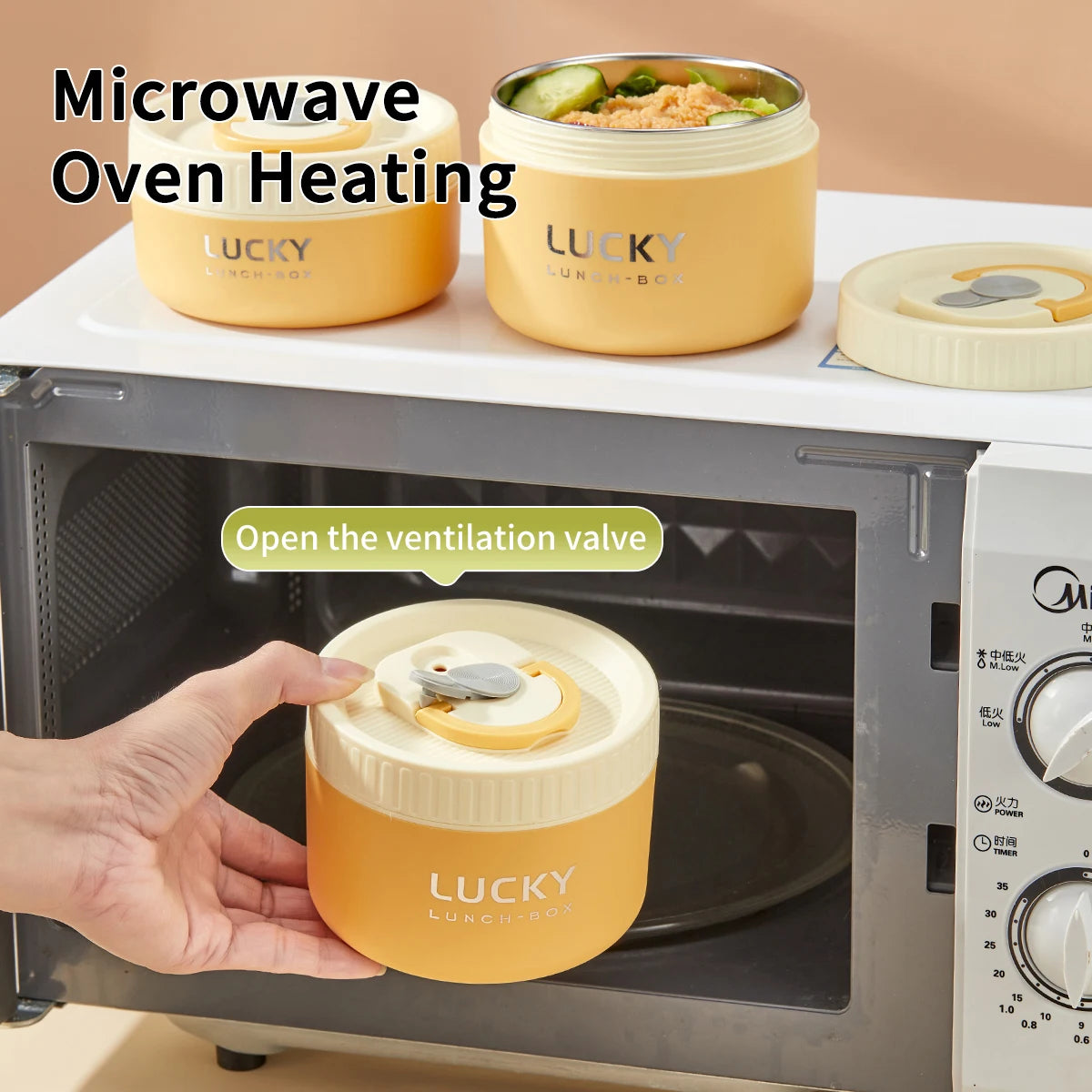 Yellow 'LUCKY' containers with food inside a microwave oven.
