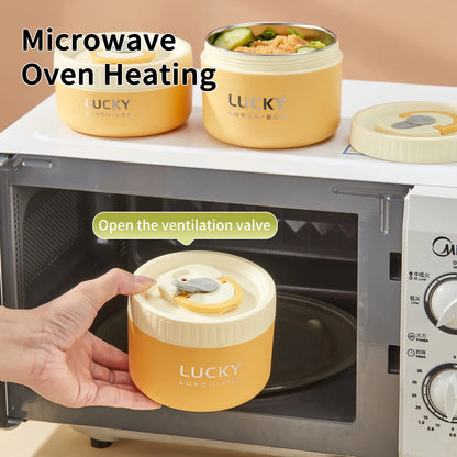 Yellow 'LUCKY' containers with food inside a microwave oven.